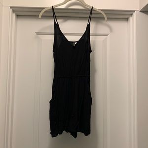 Black romper with pockets size 2